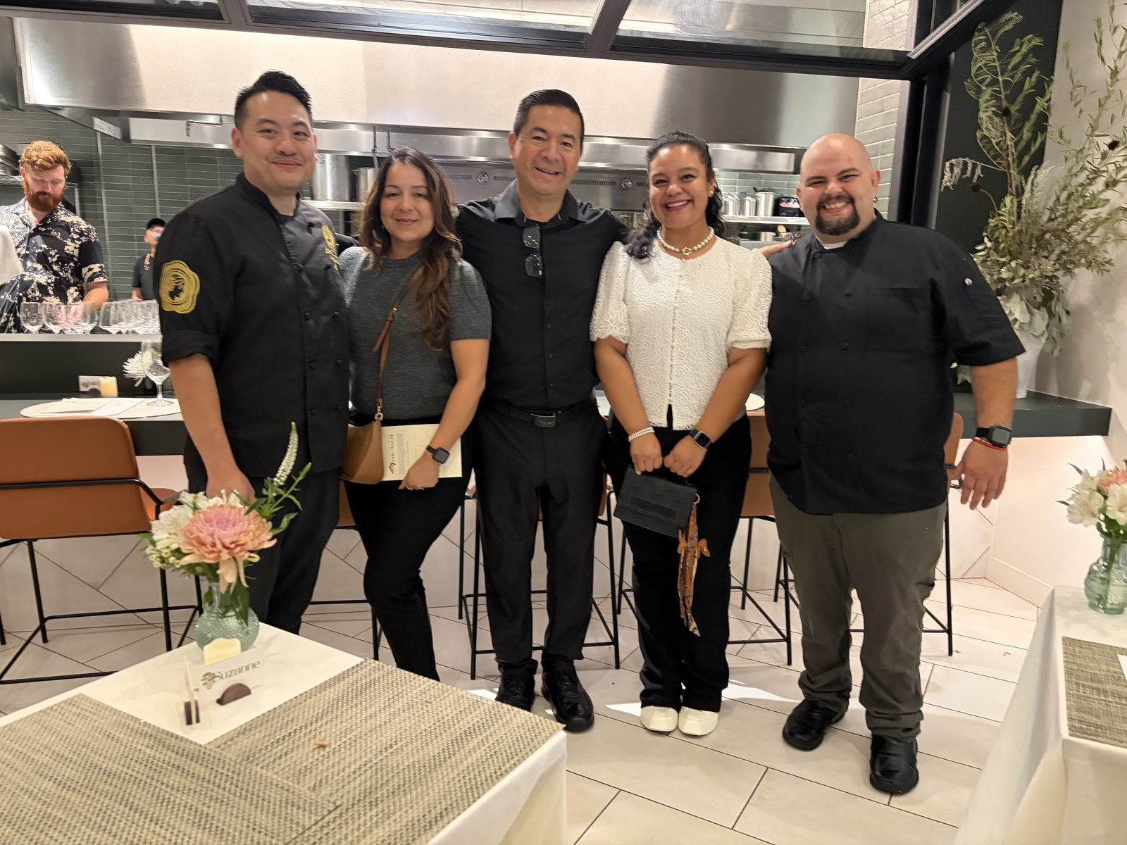 Chef Danny Le with the Chez Bacchus team in the Partake Collective kitchen after the finale